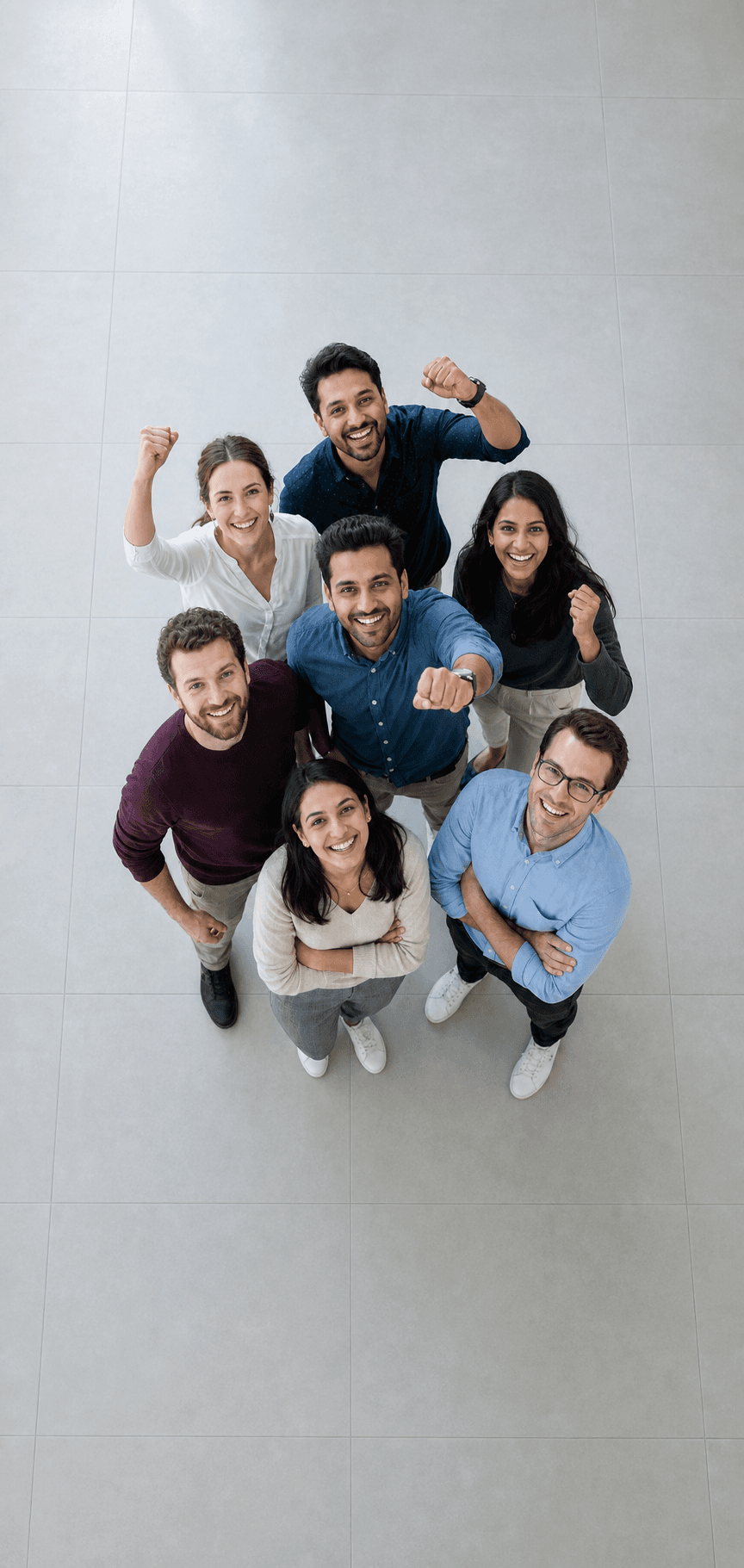 A diverse professional team celebrating together in a modern office