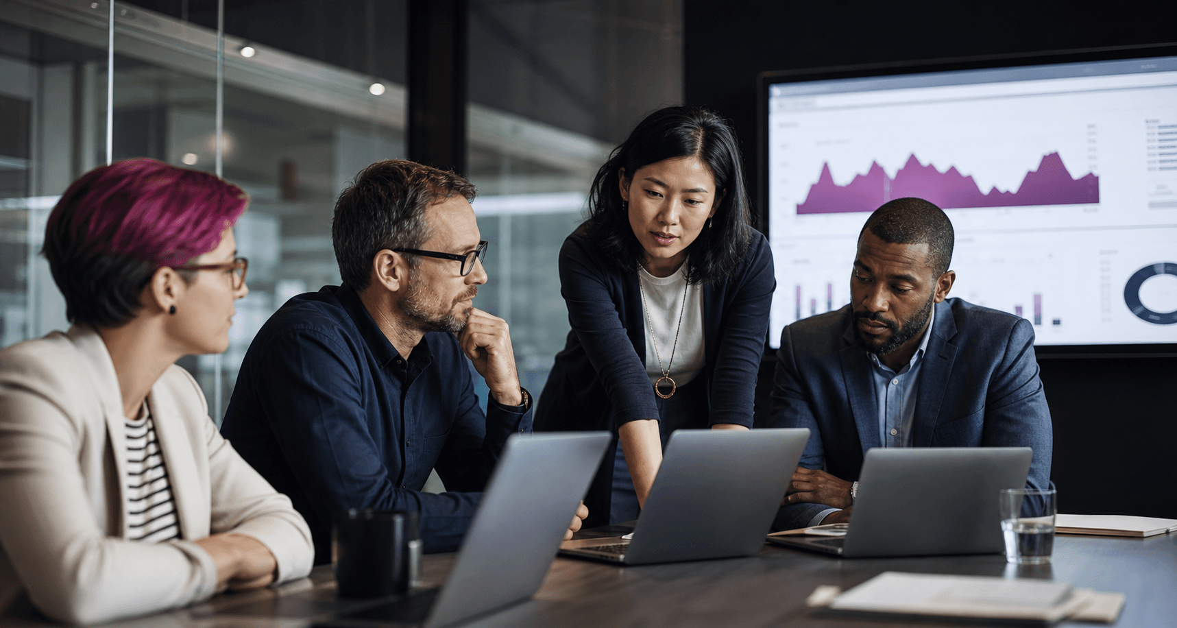 Analytics team reviewing reporting setup in a modern workspace